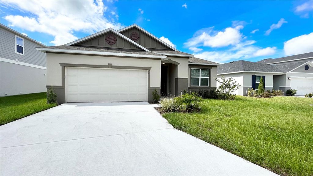 Photo of 557 Scott Lake Creek Lane, Lakeland, FL 33813 (MLS # O6401273)