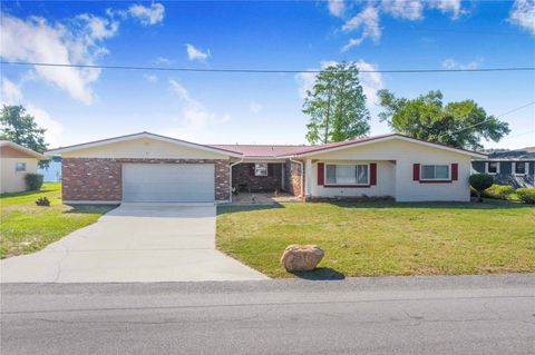 Photo of 1212 W Lake Buckeye Drive, Winter Haven, FL 33881 (MLS # L4961610)