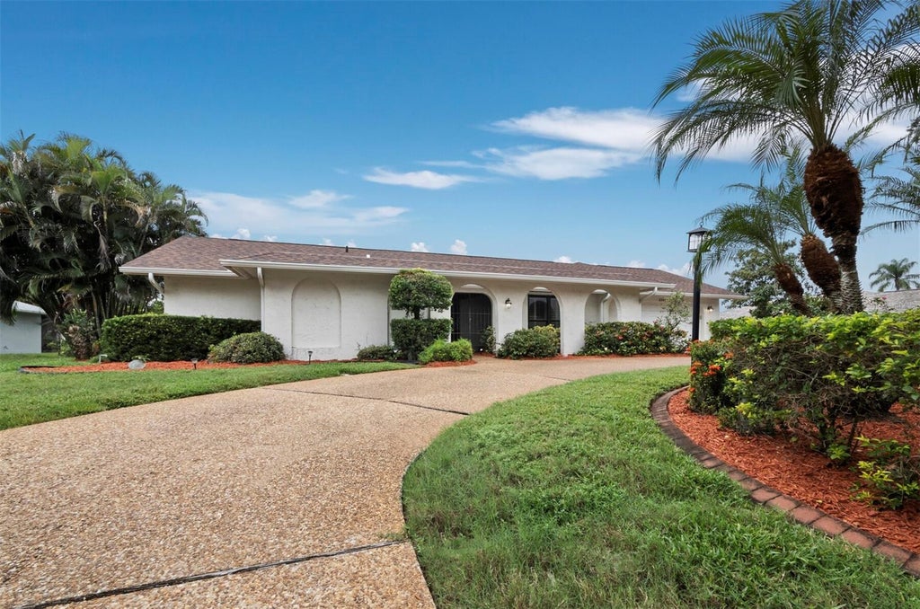Photo of 6945 Country Lakes Circle, Sarasota, FL 34243 (MLS # A4708876)