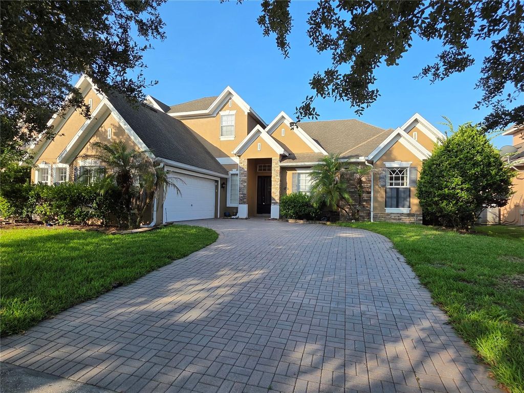 Photo of 16407 Bristol Lake Circle, Orlando, FL 32828 (MLS # O6420900)