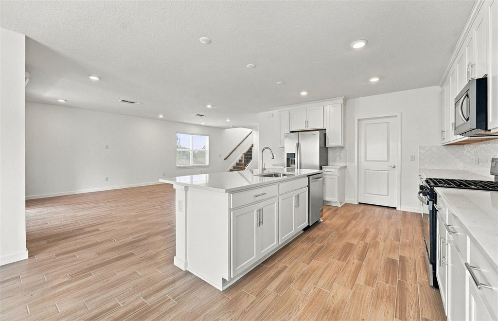 Photo of 33506 Barnebrook Drive, Wesley Chapel, FL 33545 (MLS # TB8542437)