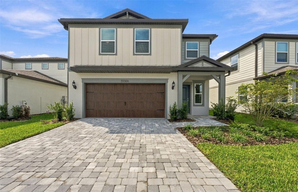Photo of 33506 Barnebrook Drive, Wesley Chapel, FL 33545 (MLS # TB8542437)