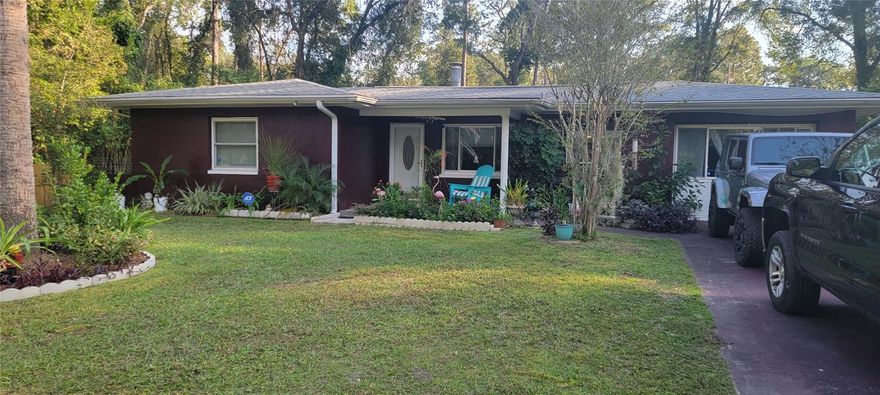 Welcome to this beautifully maintained 3-4 bedroom in ground Pool home in Inverness, FL. This residence features two bathrooms and a variety of desirable amenities. The backyard includes an enclosed in-ground pool with a bird cage, perfect for outdoor relaxation and entertainment. Inside, you'll find a cozy corner built-in fireplace, adding warmth and charm to the living space.  The gourmet-style kitchen is equipped with granite countertops, a coffee bar, and all appliances included, making it ideal for home cooking and gatherings. The main bedroom offers a private en suite bathroom, providing comfort and convenience. The guest bedrooms share a well-appointed guest bathroom.  The open floor plan seamlessly connects the dining and living areas, creating an inviting atmosphere. The versatile fourth bedroom, currently used as a TV, gaming, and additional sleeping area (converted from the old garage), features a large walk-in closet.  Additional storage options include a shed for lawn equipment and a rear-side garage currently used as a storage/workshop with an overhead door. The home is constructed with durable block and stucco. Located close to all Inverness has, including lakes, trails, theaters, golf courses, and local dining options such as [insert local restaurants names]. For outdoor recreation, enjoy nearby lakes and river access at Lake Inverness, with options for fishing, kayaking, and canoeing. Explore natural springs at nearby Rainbow Springs State Park or the Withlacoochee River for additional outdoor adventures.  This property offers a welcoming community and convenient amenities in a great location.
