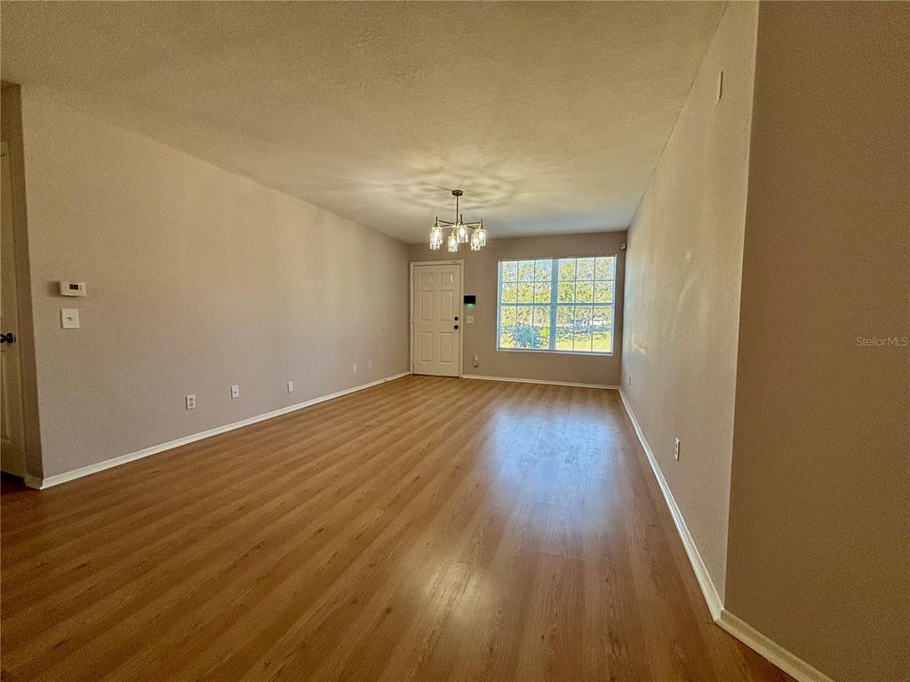 Photo of 36243 Lake Chase Boulevard #103, Zephyrhills, FL 33541 (MLS # O6347240)