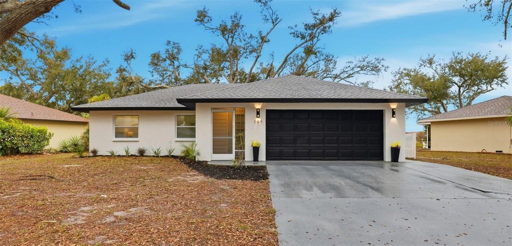 Photo of 664 Sugarwood Trail, Venice, FL 34292 (MLS # O6378971)