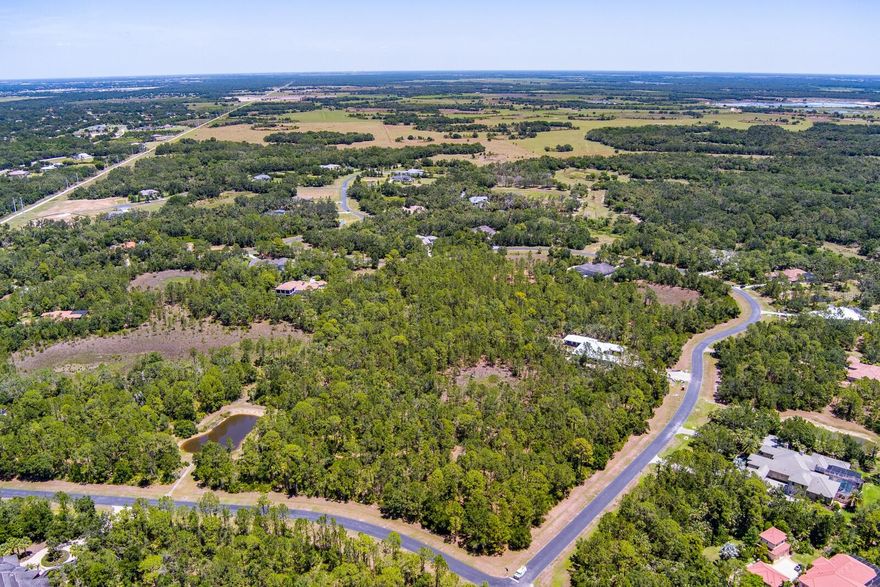 NEW IMPROVED PRICE ~ BEST PRICED IN THE COMMUNITY ~ BUILD YOUR DREAM HOME! Have you been looking for the perfect spot to build your dream home?  Well you have found it, this gorgeous 3.98 acre wooded corner lot gives you the opportunity to situate your custom home several ways. You will have complete privacy, peace and tranquillity along with natural beauty and tons of wildlife. The Forest at The Hi Hat Ranch is a beautiful gated community with 54 Estate sized homesites all between 3 to 5 acres and situated on 270 acres. There are two private lakes within the community for you to enjoy. Each home is custom built to your specifications and all are architecturally unique. The Forest has an Approved Builder program offering some of the very best custom builders within Sarasota to choose from, including Arthur Rutenberg, Vision Homes, Anchor Builders and John Cannon Homes. The Forest at the Hi-Hat is located only 13 miles from one of the most famous beaches in the area, Siesta Key Beach. It is only 5 miles to I75, and near downtown Sarasota, where you can find a plethora of shopping, dining, and entertainment options.