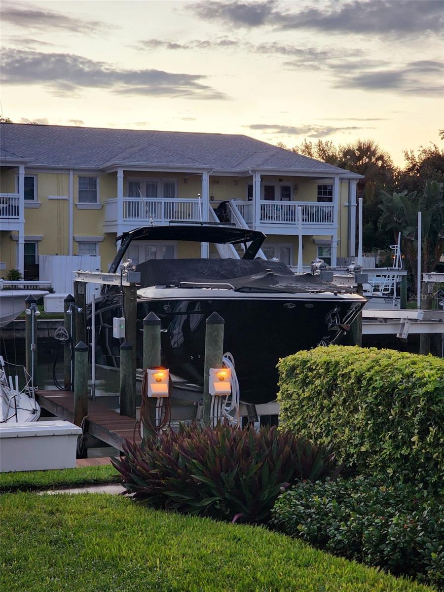 Individual Deeded Boat Slip with Open Water Access – 16k lb. lift new in 2022. Located in the gated Coquina Key community. The slip is # 172 SS Located behind Unit C offers direct access to Tampa Bay and the Gulf of Mexico with no fixed bridges. Designed to accommodate larger vessels this slip is equipped with a 16,000 lb. capacity boat lift, electric, water, and a storage box right next to it. Ownership is exclusively available to current condo owners within Waterside at Coquina Key North or South and may be leased to fellow residents. Dock maintenance is managed by the Condo Dock Association