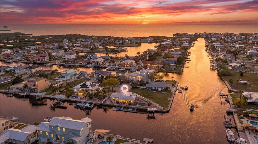 CUL-DE-SAC WATERFRONT POOL HOME with BOAT LIFT & DIRECT GULF ACCESS – a TRUE BACKYARD OASIS for boaters, plus a FLORIDA ROOM THAT CAN EASILY BE CONVERTED INTO A THIRD BEDROOM!
Welcome to your own slice of WATERFRONT PARADISE! Tucked away on a quiet cul-de-sac along a deep, wide canal with DIRECT GULF ACCESS, this beautifully RENOVATED 2 BEDROOM, 2 BATH home offers the perfect blend of comfort, style, and the ultimate Florida boating lifestyle.
The outdoor space is designed for ENTERTAINING and RELAXATION, featuring a HEATED DIAMOND BRITE SALTWATER POOL with IONIZER SYSTEM, a SCREENED PAVER POOL DECK, additional SCREENED PATIO, and an OPEN PAVER PATIO—all overlooking tranquil water views. Boating enthusiasts will love the 145 FEET OF SEAWALL, TWO 24x8 DOCKS, and a 13,000 LB BOAT LIFT, providing plenty of room for multiple vessels and quick access to the Gulf.
Inside, the COMPLETELY UPDATED interior showcases WOOD-LOOK TILE FLOORING THROUGHOUT, PLANTATION SHUTTERS, and abundant natural light. The living area flows seamlessly to the waterfront through sliding glass doors, creating ideal INDOOR-OUTDOOR LIVING. The UPDATED KITCHEN features an ISLAND, FARMHOUSE SINK, GRANITE COUNTERTOPS, STAINLESS STEEL APPLIANCES, and ample cabinetry. The dining room is highlighted by a GRAND STONE WOOD-BURNING FIREPLACE and large picture window with water views.
The SPACIOUS PRIMARY SUITE offers a WALK-IN CLOSET and a beautifully UPDATED EN-SUITE BATHROOM with FLOOR-TO-CEILING TILE SHOWER, SEAMLESS GLASS, and built-in bench. The SECOND BEDROOM is generously sized, and the GUEST BATH includes a tub/shower combo. A DEDICATED INDOOR LAUNDRY ROOM adds convenience. The UNDER-ROOF FLORIDA ROOM overlooking the water provides flexible space and can easily be converted into a THIRD BEDROOM, OFFICE, or additional living area.
Major upgrades include IMPACT WINDOWS & DOORS (2018), METAL ROOF (2023), and NEW AC SYSTEM (2023). The home also offers TRANSFERABLE FLOOD INSURANCE at approximately 3,371/YEAR (a significant savings compared to new policies) and CURRENT HOMEOWNERS INSURANCE of approximately 1,666/YEAR thanks to key upgrades.
Additional features include an OVERSIZED DRIVEWAY, ONE-CAR GARAGE, POWERED SHED, and WHITE PVC FENCING around the pool for added privacy. Located in HERNANDO BEACH, a golf cart friendly waterfront community with NO HOA, NO DEED RESTRICTIONS, and SHORT-TERM RENTALS ALLOWED—making this ideal as a PRIMARY RESIDENCE, VACATION HOME, or INCOME-PRODUCING INVESTMENT.
Just minutes from Weeki Wachee Springs, shopping, dining, hospitals, and the Suncoast Parkway for easy access to Tampa and beyond. This DIRECT GULF ACCESS WATERFRONT HOME delivers the ULTIMATE FLORIDA COASTAL LIFESTYLE—where every day feels like a vacation.