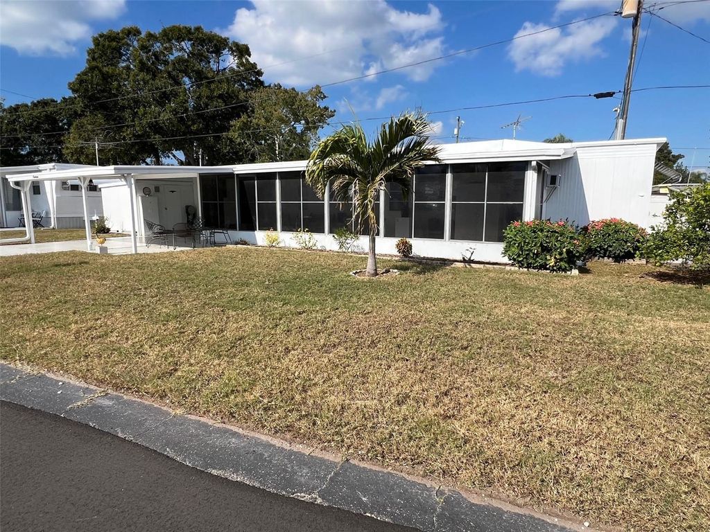 Photo of 12766 Seminole Boulevard #19, Largo, FL 33778 (MLS # TB8450270)