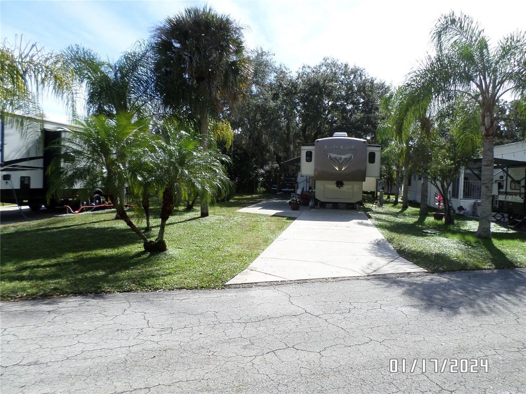 Photo of 76 NW Roan Road, River Ranch, FL 33867 (MLS # TB8457752)