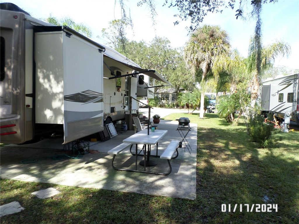 Photo of 76 NW Roan Road, River Ranch, FL 33867 (MLS # TB8457752)