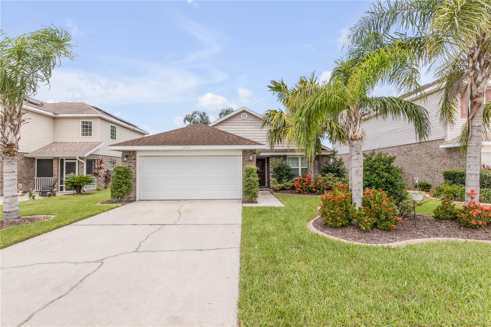 Welcome to this beautifully updated 3-bedroom, 2-bathroom home in the highly desirable Coquina Cove community of Port Orange, where modern features, functional design, and a peaceful setting come together. From the moment you arrive, the home’s inviting curb appeal sets the tone for what awaits inside. Step through the front door into an airy open floor plan that allows the living, dining, and kitchen areas to blend seamlessly—making the space perfect for everyday living as well as entertaining friends and family.
The primary suite serves as a comfortable and private retreat, complete with an en suite bathroom featuring updated fixtures, ample storage, and a fresh, contemporary feel. Two additional bedrooms are generously sized and offer flexibility for a variety of needs—whether that’s space for family, visiting guests, a playroom, or a dedicated home office. A second full bathroom, thoughtfully designed with modern touches, serves these rooms and the main living areas.
At the heart of the home, the kitchen stands out with its sleek countertops, modern cabinetry, stainless steel appliances, and a breakfast bar that provides the perfect spot for casual dining or morning coffee. The open-concept layout ensures the kitchen flows naturally into the dining and living spaces, making it easy to stay connected whether you’re cooking, relaxing, or hosting gatherings.
One of the highlights of this home is the large outdoor patio overlooking serene water views. This space is ideal for unwinding after a long day, hosting weekend cookouts, or simply enjoying the sights and sounds of nature right from your backyard. The combination of indoor and outdoor living areas provides the perfect setting for both relaxation and entertaining.
Situated in a prime location, this home is just minutes from top-rated schools, shopping, dining, and the beautiful beaches that make Port Orange such a sought-after area. With its tasteful updates, versatile layout, and scenic setting, this property offers an exceptional opportunity to enjoy the best of both comfort and convenience.