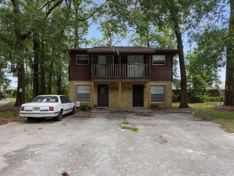 Photo of 7034 SW 17th Place, Gainesville, FL 32607 (MLS # GC544188)