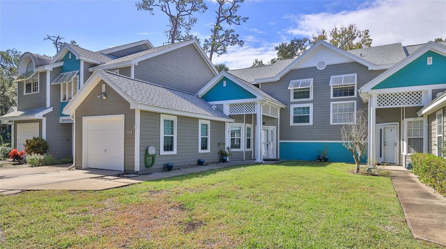 WOW!   Hidden treasure in the heart of Daytona Beach...loaded with updates & move in ready!   This quiet complex, with just 24 units, has a community pool, mature trees,  & a great location close to the restaurants, shopping, Downtown Daytona Beach!!    And best of all, it's walking distance to The Daytona Beach Golf Club, a public course!   Walk out your back door & watch them play....or take a 3 minute walk to the Clubhouse to start your own game!   Striking kitchen with updated cabinets, granite, tiled backsplash & LG stainless steel appliances. Gorgeous plank tile throughout the condo, updated vanities in all bathrooms. Newer double paned windows!  Cellular blinds,  plantation shutters throughout!  Updated ceiling fans & light fixtures. Spacious downstairs master suite offers double vanity with quartz countertop, walk in shower, & walk in closet!   Bonus room overlooking the golf course would be a perfect home office (that view!) Living/dining room with vaulted ceiling. Welcome home!