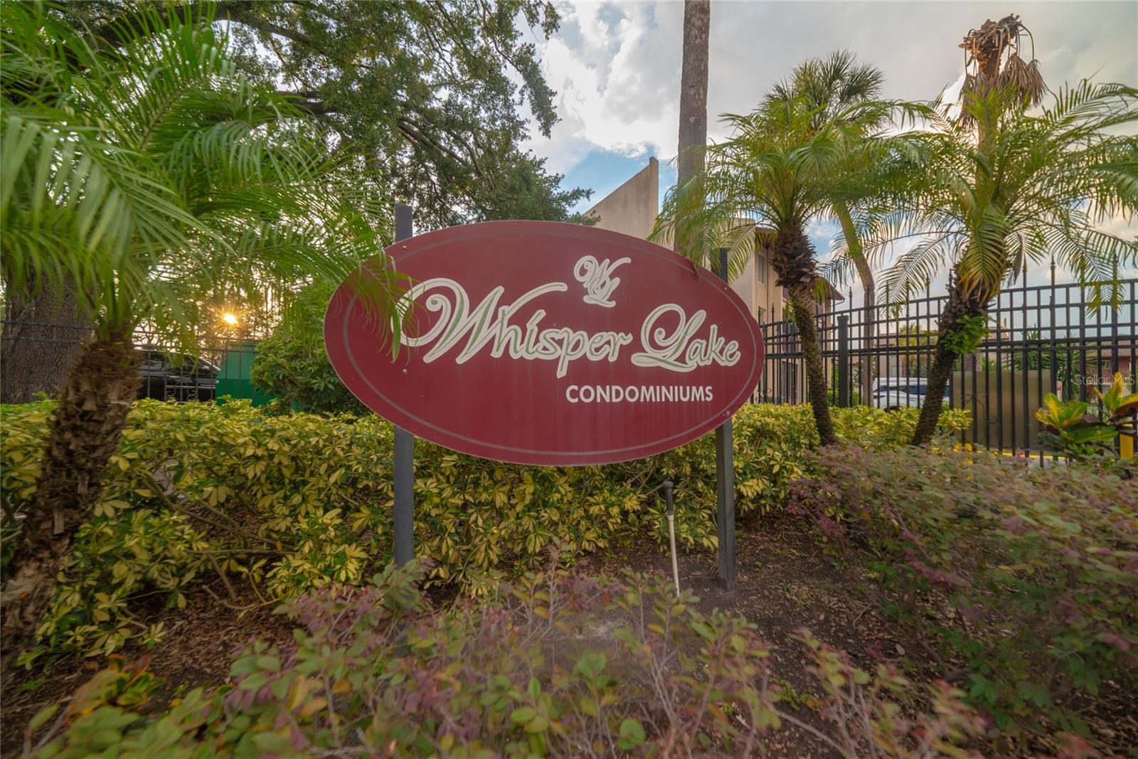 Come and discover one of the most desirable units in the gated community of Whisper Lake! This beautifully updated 1-bedroom, 1-bathroom condo is move-in ready and ideal as a first home or an excellent rental investment! Step inside to an open-concept living and dining area that flows seamlessly to a private screened patio—your perfect spot to unwind while enjoying views of the sparkling pool and lush mature trees. The kitchen shines with refreshed cabinetry, a deep sink, and sleek stainless steel appliances, while natural light floods the space through large sliding doors, creating a warm and inviting atmosphere throughout. The spacious bedroom offers a walk-in closet, plush new carpet, and plenty of comfort. The bathroom has been tastefully remodeled with a modern vanity, new bathtub, and stylish contemporary finishes. Additional upgrades include a brand-new electrical panel with surge protection, updated flooring, fresh interior paint, upgraded door hardware, and professionally installed insulation above the living room for improved energy efficiency. For added convenience, the great room offers a second walk-in closet that can easily double as a home office.
This unit is ideally located on the top floor at the quieter end of the community, offering east-to-west views, close proximity to the less-busy pool, and privacy away from the noise of Dale Mabry Highway. Whisper Lake provides residents with three community pools, a clubhouse, serene walking trails, beautiful landscaping, relaxing pond views, ample guest parking, and newly installed roofs in 2023 with hurricane clips for peace of mind. Centrally located with quick access to I-275, Downtown Tampa, Raymond James Stadium, International Plaza, dining, and shopping, this home combines comfort, convenience, and value in one unbeatable package. Don’t miss this rare opportunity to own one of Whisper Lake’s finest units!