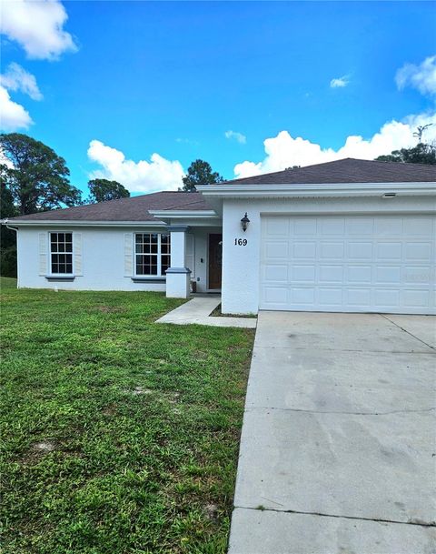 Photo of 169 Brown Avenue S, Lehigh Acres, FL 33974 (MLS # C7515431)