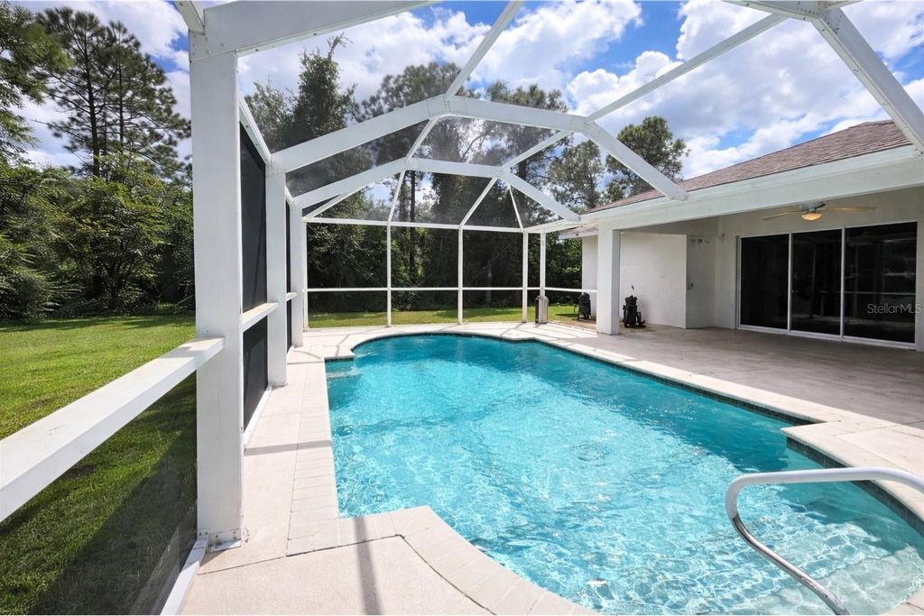 Photo of 169 Brown Avenue S, Lehigh Acres, FL 33974 (MLS # C7515431)