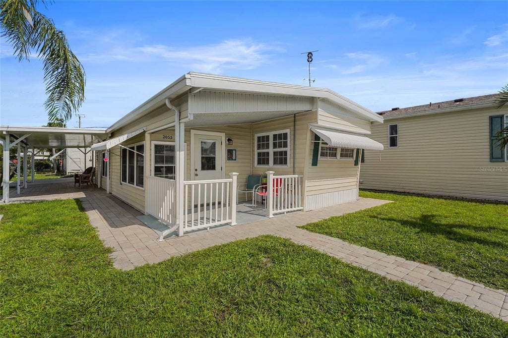 Photo of 2055 Champion Street, Sarasota, FL 34231 (MLS # A4707133)