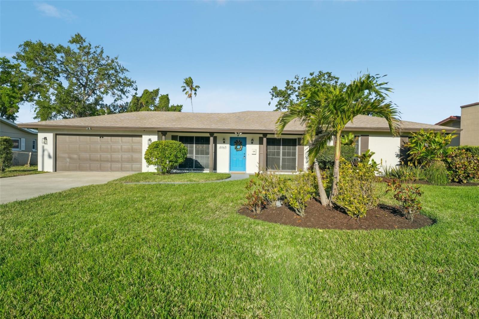 One or more photos have been virtually staged. Welcome to this one-story executive home in the coveted Broadwater Community of St. Petersburg. Meticulously renovated, this 3-bedroom, 2-bathroom, 2-car garage residence showcases top-quality materials, features, and finishes that epitomize elegance and sophistication. From the moment you arrive, you’ll notice the impressive curb appeal, lush landscaping, and spacious driveway. Inside, the seamless open-concept layout harmoniously integrates the living spaces. The spacious living room, filled with natural light from a large picture window, creates an open and airy ambiance perfect for entertaining. The chef’s kitchen features quartz countertops, a stylish tile backsplash, and newer stainless-steel appliances. The primary suite offers a generously sized retreat with a cozy sitting area, ensuite bath, and a walk-in shower. The home also includes a spacious two-car garage for added convenience. This residence is being sold turnkey, with every detail thoughtfully designed to reflect unparalleled craftsmanship. Broadwater is one of St. Petersburg’s most desirable neighborhoods, offering quick access to the beaches, downtown St. Pete, airports, interstates, shopping, and restaurants. Experience this extraordinary Florida paradise where coastal charm meets modern luxury. Schedule your private tour today!