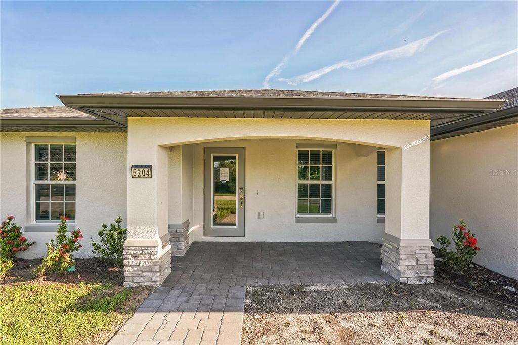 Photo of 5204 Anderson Road, Port Charlotte, FL 33981 (MLS # O6340682)