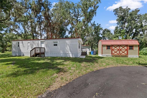 Photo of 3809 Jerry Smith Road, Dover, FL 33527 (MLS # TB8545534)