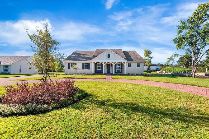 Luxury Lakefront Living with No HOA on Little Banana Lake!   Farmhouse-inspired curb appeal welcomes you at the front porch, while water views greet you from the moment you arrive.  Discover the perfect blend of modern comfort and timeless design in this brand-new Carolina floor plan. Situated on nearly an acre (.91 acres) in highly sought-after South Lakeland, this 4-bedroom, 3-bathroom home with a den offers 3,153 sq. ft. of elegant living space and direct waterfront access—ideal for fishing, kayaking, or adding your own private dock for boating.

The open-concept layout centers around a gourmet kitchen with a large island, breakfast nook, quartz countertops, Frigidaire Gallery appliances, a large walk-in pantry, and a spacious great room, plus additional living and dining areas perfect for entertaining. Sliding doors extend the living space onto an oversized covered lanai, creating the ultimate indoor/outdoor retreat.  

The owner’s suite is a private haven with multiple closets and a spa-inspired bath featuring quartz vanities, a soaking tub, and a walk-in dual shower.  This home also features Engineered hardwood floors, custom lighting fixtures, ceiling fans, crown molding, tray ceiling in master suite, circular driveway with pavers, and an oversized two car garage.

With no HOA, you’ll enjoy more freedom and fewer restrictions on how to make this home your own. Don’t miss this rare opportunity to own lakefront property in one of Lakeland’s most desirable locations.

Schedule your private tour today!