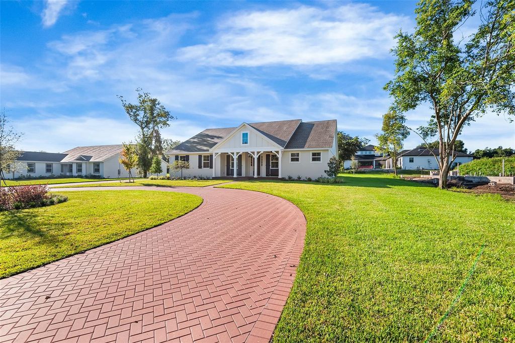 Photo of 2561 Rogers Road, Lakeland, FL 33812 (MLS # TB8430621)