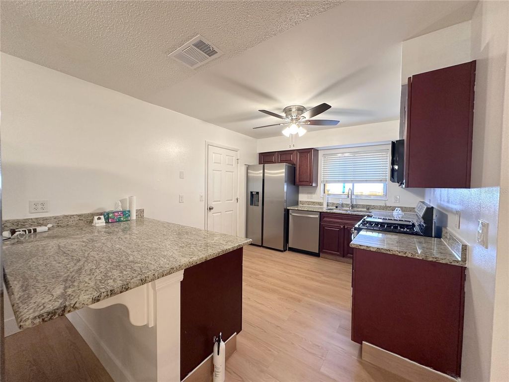 Photo of 10848 Wilderness Court, Orlando, FL 32821 (MLS # O6376994)