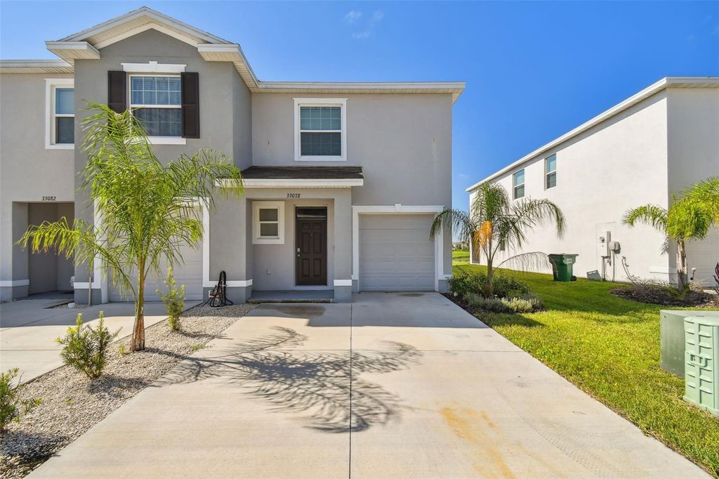 Photo of 33078 Major Oak Drive, Wesley Chapel, FL 33545 (MLS # TB8419368)