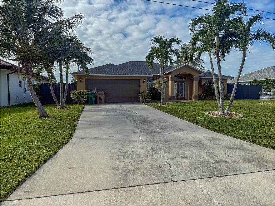 Welcome to your Florida dream home! This spacious 4-bedroom, 2-bathroom property offers 2,167 square feet of comfortable living, perfectly positioned on a canal with direct water access—ideal for boating, kayaking, or simply enjoying peaceful waterfront views.

Inside, you'll find an open and inviting floor plan filled with natural light. The large living and dining areas offer plenty of room for entertaining or relaxing with family, and the kitchen provides ample space for cooking and gathering.

The primary suite features a private en-suite bathroom and generous closet space, while three additional bedrooms offer versatility for guests, a home office, or a growing family.

Step outside to your own private retreat—a screened-in pool area overlooking the canal, perfect for weekend barbecues or sunset swims.