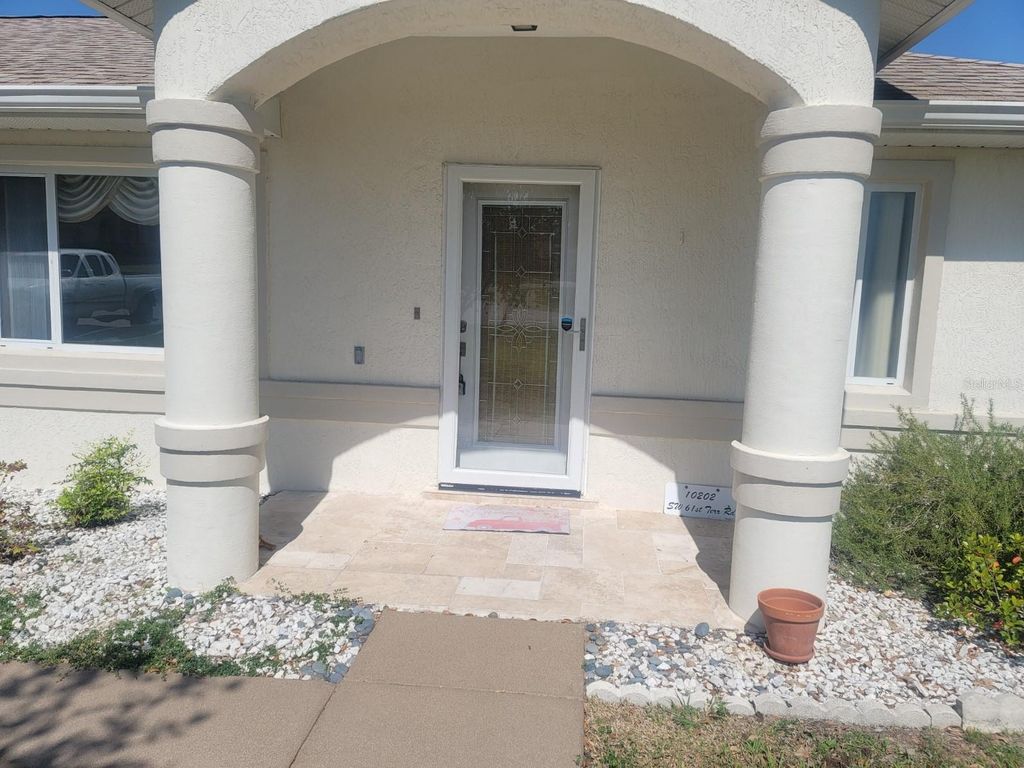 Photo of 10202 SW 61st Terrace Road, Ocala, FL 34476 (MLS # OM721722)