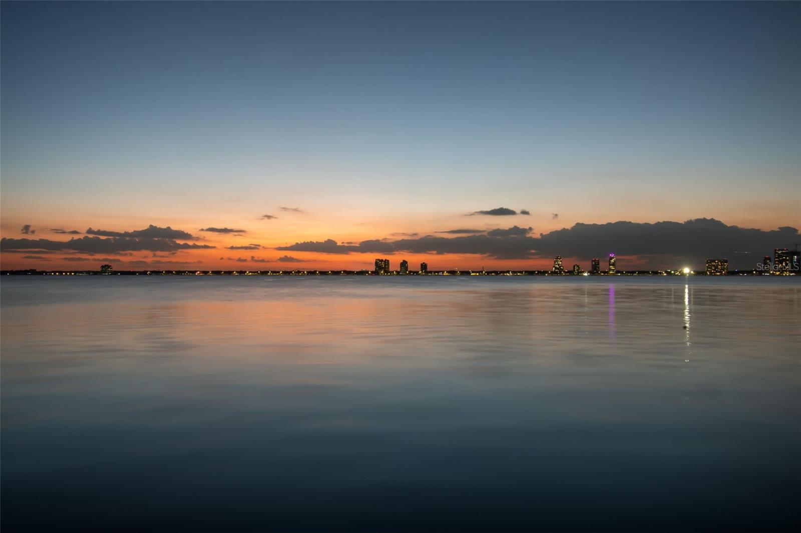 RARE NEW CONSTRUCTION OPPORTUNITY - PREMIER WATERFRONT LOT | Seize this exceptional new construction opportunity on the renowned Riviera Drive in Davis Islands. Offering 77 feet of direct waterfront frontage with unobstructed open bay views of Hillsborough Bay, this prime 0.30-acre lot is the perfect canvas to build a custom luxury estate in one of Tampa’s most sought-after waterfront communities. The existing home, a 4-bedroom, 2.5-bath mid-century ranch, sustained significant damage and flooding from Hurricane Helene and is being sold as a teardown, making this an ideal site for new construction. This is a rare chance to create a modern waterfront masterpiece with expansive indoor-outdoor living, a private dock, and unparalleled views. The concrete seawall provides a strong foundation for future development, maximizing the potential of this premier location. Situated minutes from downtown Tampa, Davis Islands is known for its exclusive island lifestyle, featuring a marina, public boat ramps, a private airport, a dog park, and golf cart-friendly streets. This coveted community offers the perfect blend of privacy and accessibility, with top-tier dining, shopping, and entertainment nearby.