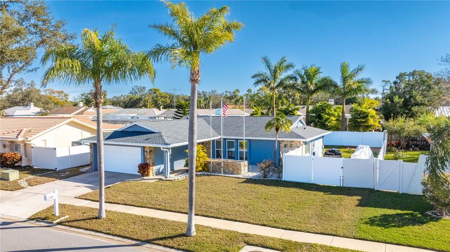 LOOK NO FURTHER! Welcome to this beautifully updated, move-in-ready home located in one of Seminole’s most highly sought-after neighborhoods where all MAJOR upgrades have been completed for a piece of mind. Situated on a quiet dead-end street and located in unincorporated Seminole within an "X" flood zone (no flood insurance required), this property offers flexibility and an exceptional Florida lifestyle. This 3-bedroom, 2-bath residence with a 2-car garage features a bright, airy, open floor plan accented by tall cathedral ceilings in the main living area. The remodeled kitchen is the heart of the home, offering stainless steel appliances, a convenient breakfast bar, granite counter tops and seamless flow into the dining and living spaces, perfect for everyday living and entertaining. Both bathrooms have been tastefully upgraded, and the home offers abundant storage throughout, including a separate, spacious laundry room. Major improvements have already been completed, including hurricane-rated windows and doors (2024), roof replacement (2021), and HVAC upgrade (2016) allowing the next owner to move in with confidence. Enjoy your morning coffee in the enclosed lanai providing additional living space and tranquility while overlooking the spacious backyard that offers plenty of room for a pool featuring an elevated garden with irrigation. There is also ample space for RV and boat parking, a rare and valuable feature. Ideally located just five minutes from the Gulf beaches, this home is zoned for top-rated schools and offers close proximity to Oakhurst Publix, coffee shops, dining, and premier shopping. Whether you’re seeking convenience, comfort, or coastal living 5 minutes from top rated Florida Beaches, this home truly has it all. Turn-key, thoughtfully upgraded, and ideally positioned, this is Seminole living at its finest. No rent restrictions!!