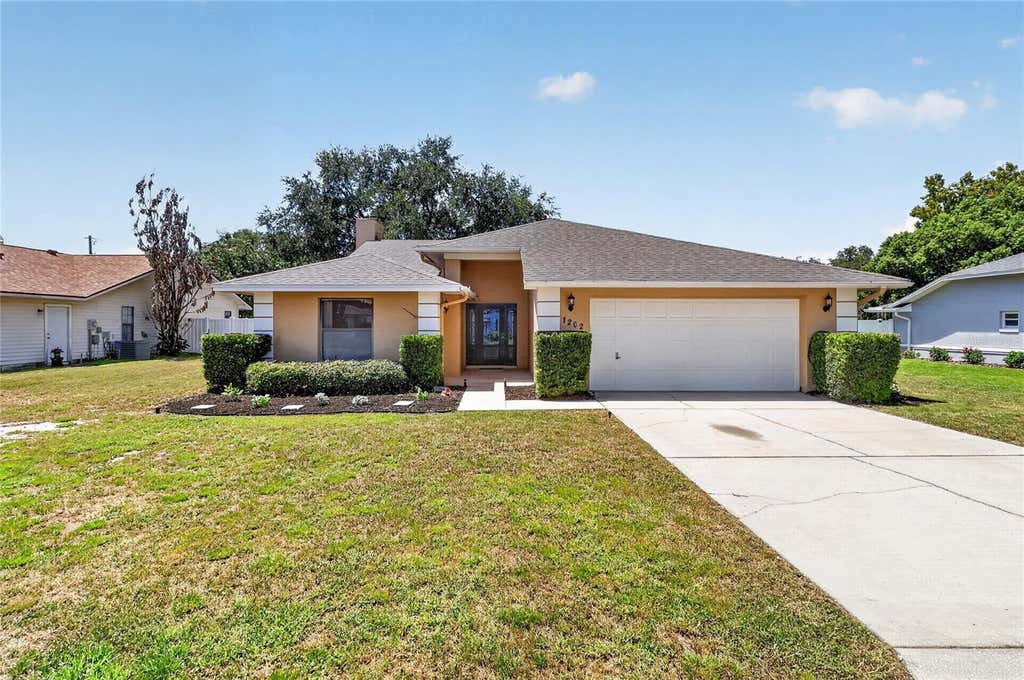 Photo of 1202 Valencia Lane, Auburndale, FL 33823 (MLS # TB8540326)