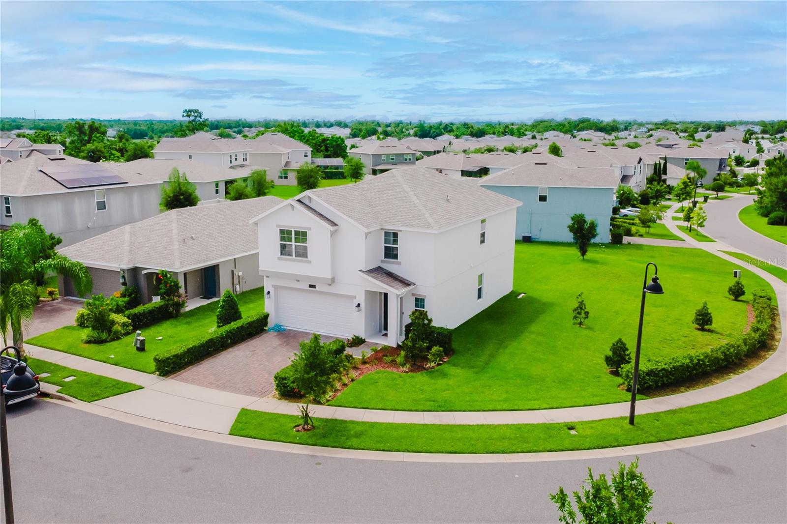 This stunning 5-bedroom, 2.5-bath home with 2,194 sq. ft. is located in the highly desirable Arden Park community of Ocoee and sits proudly on a spacious corner lot.
Step inside and enjoy the bright, open floor plan featuring a welcoming living room, dining area, and a modern kitchen with a large island and pantry—perfect for everyday living and entertaining. The Owner’s Suite, conveniently located on the first floor, offers a relaxing retreat with a walk-in shower, dual vanity, and generous walk-in closet. Upstairs, you’ll find four additional bedrooms, a full bath, and a versatile loft, ideal for a playroom, office, or media space.
Set on a 45’ corner homesite, this property offers added privacy and natural light, with charming curb appeal framed by mature oaks. Arden Park residents enjoy a resort-style pool, cabana, parks, and direct access to the West Orange Trail, making it easy to balance relaxation and recreation.
With timeless architectural details, energy-efficient design, and a prime location close to shopping, dining, and major highways, this home offers both comfort and convenience.