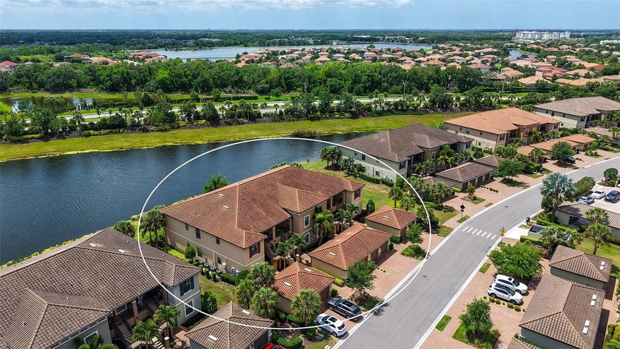 An exceptional investment opportunity with a lease already in place, this garden condominium in Esplanade Golf & Country Club offers immediate income and long-term value in one of Lakewood Ranch’s most sought-after communities. This Caserta VII floor plan includes two bedrooms, two baths, and a versatile den or flex space, thoughtfully designed with an open-concept layout. The foyer leads to a spacious dining area and great room, where sliding glass doors open to a covered, screened lanai with peaceful lake and golf course views. The kitchen is well-appointed with 42-inch crème cabinetry, granite countertops, and an oversized island that seamlessly connects to the main living areas. The primary suite features dual vanities, a large walk-in shower, a private water closet, and two generous walk-in closets. A private hallway provides separation for the guest bedroom and bath, offering comfort and privacy for visitors. The residence also includes a one-car detached garage. Ownership includes a golf membership, along with access to Esplanade’s extensive resort-style amenities set across approximately 600 acres of lakes, preserves, and natural beauty. Residents enjoy two resort-style pools, a resistance pool, fitness centers, sports courts, dining venues, outdoor gathering spaces, and a full social calendar—all easily accessible by golf cart. Lakewood Ranch is the number one best-selling, multigenerational community in the country and located near world-class shopping, dining, entertainment and is minutes to I-75, beaches, great schools and medical facilities.