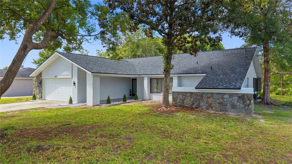 Photo of 3017 Bayshore Drive, Spring Hill, FL 34608 (MLS # TB8544650)