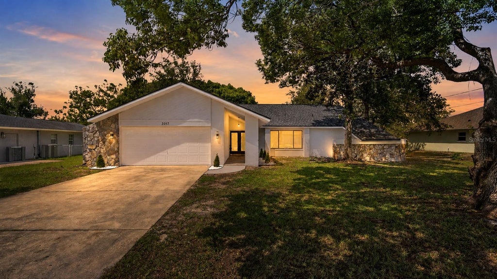 Photo of 3017 Bayshore Drive, Spring Hill, FL 34608 (MLS # TB8544650)
