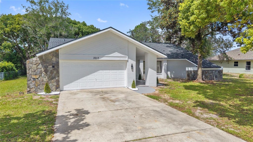 Photo of 3017 Bayshore Drive, Spring Hill, FL 34608 (MLS # TB8544650)