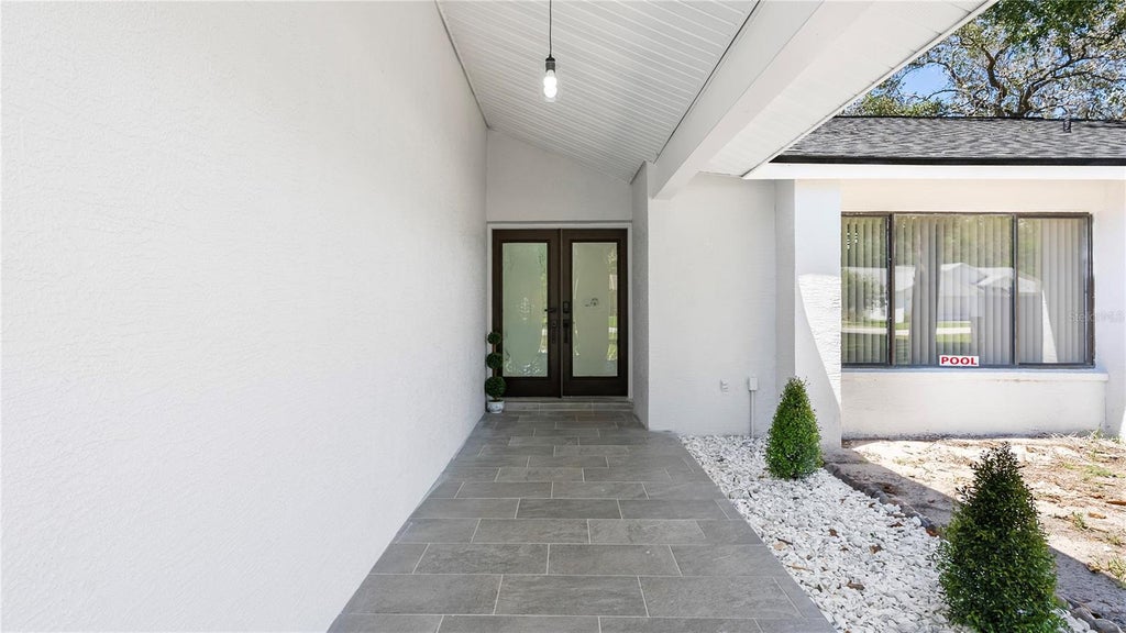 Photo of 3017 Bayshore Drive, Spring Hill, FL 34608 (MLS # TB8544650)