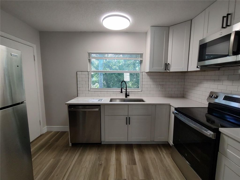 Photo of 316 W Howry Avenue #4, Deland, FL 32720 (MLS # O6349299)