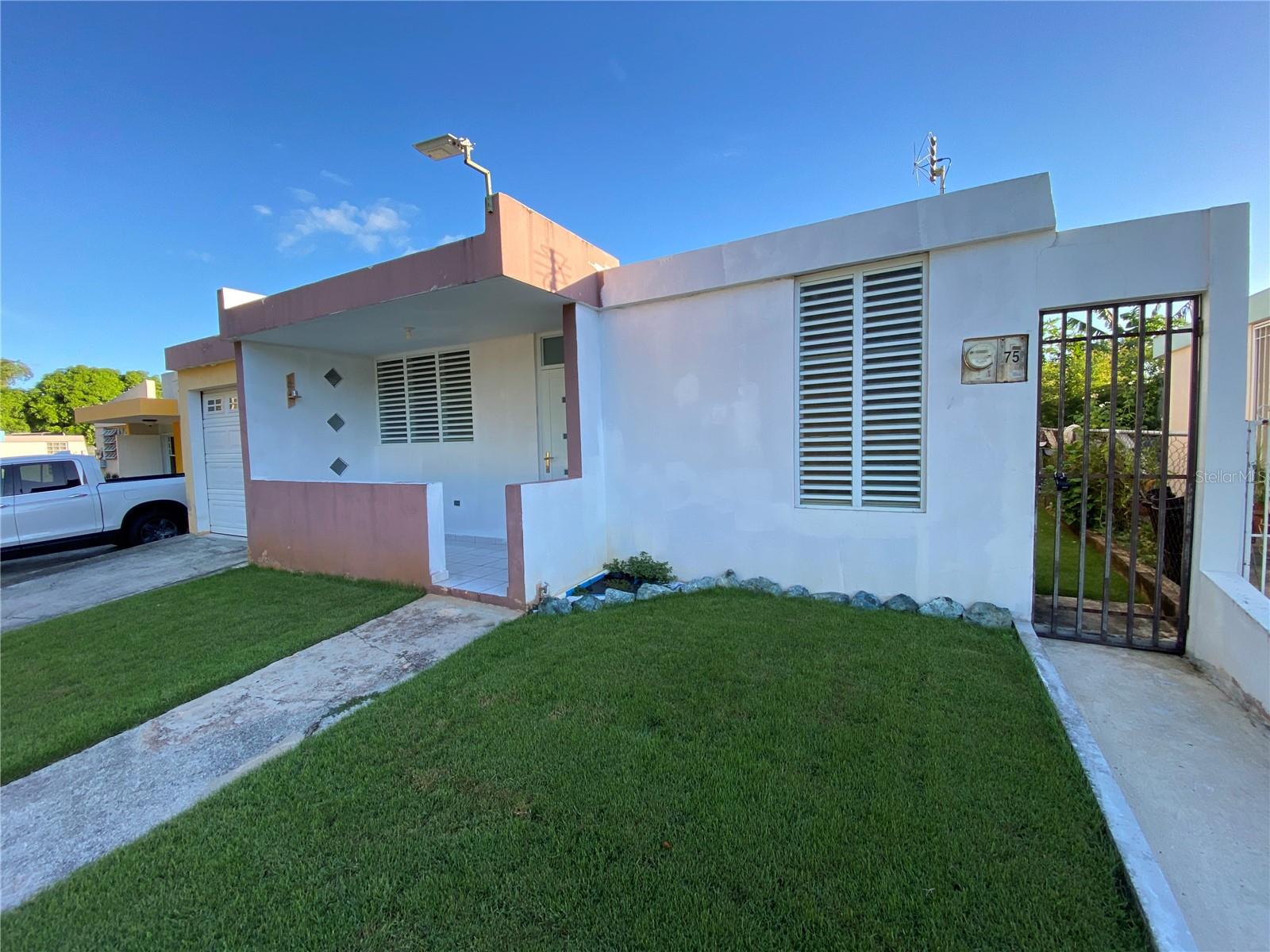 Urb Monte Rio, a vibrant community nestled in the breathtaking coastal town of Cabo Rojo – a region renowned for its pristine beaches, rich culture, and laid-back lifestyle. This meticulously updated single-family home is located at Tallaboa Street #75 and offers comfort, functionality, and modern upgrades ready to delight its new owners.
?? Property Highlights:
3 Spacious Bedrooms and 2 Full Bathrooms, offering the perfect layout for comfortable living.
Extended Carport for additional parking or recreational use.
New Windows, New Doors, and a Brand-New A/C System in the Main Room for energy-efficient cooling.
Garage Door provides secure access and convenience.
Included in the sale are a New Washer and Dryer and a Water Reserve Tank – practical additions for everyday ease.
Step into the Main Bedroom, which stands out with its generous space and elongated design, providing a relaxing retreat unmatched by typical homes in the neighborhood.
In the backyard, you'll find a 12' x 12' Concrete Storage House, perfect for extra storage or creative use. The lot spans 300 sq. meters, with a Gross Living Area of approx. 1,026 sq. ft. – ample space to enjoy both indoors and outdoors.
?? Why Cabo Rojo?
This residence is set in a prime location where the charm of coastal living meets modern conveniences. Just minutes from Cabo Rojo's renowned beaches, marinas, and world-class restaurants, you’ll experience:
Warm, Tropical Breezes year-round.
Stunning Natural Reserves like Punta Guaniquilla and Combate Beach.
A welcoming community and vibrant local culture.
?? Important Showing Details:
Office Hours: Monday to Friday, 9:00 AM to 1:00 PM.
No Weekend Showings and No Same-Day Appointments – please schedule 2-3 days in advance.
Required: Buyers must provide a Pre-Approval Letter or Proof of Funds prior to scheduling showings.
Buyer's Agents/Brokers: Ensure all necessary documentation is completed before requesting appointments.
Don’t miss the chance to own a beautiful, upgraded home in one of Puerto Rico’s most desirable regions! For more information or to schedule your showing, call or text
