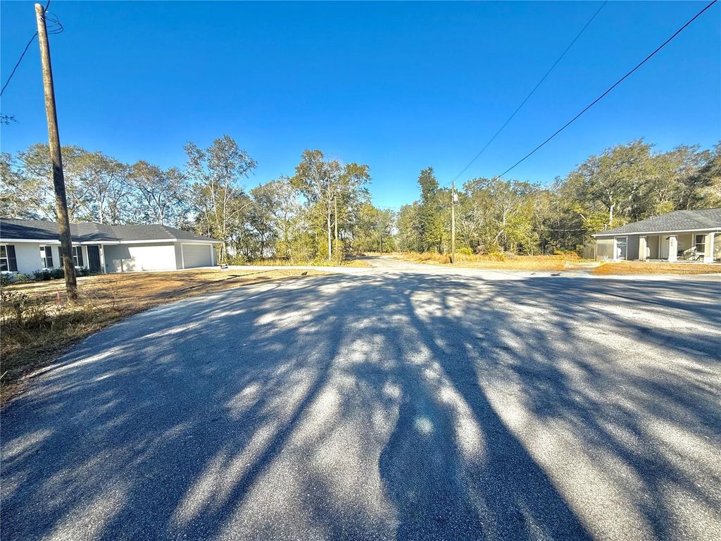 Photo of Tbd Locust Pass Ct, Ocala, FL 34472 (MLS # OM718028)