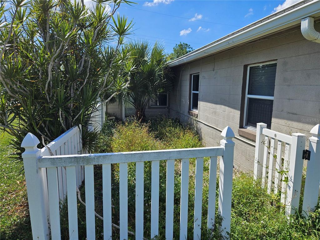 Photo of 125 Poinsettia Circle NE, Port Charlotte, FL 33952 (MLS # TB8438826)