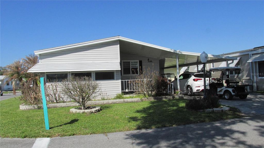 Photo of 102 Newcastle Boulevard, Haines City, FL 33844 (MLS # L4960684)