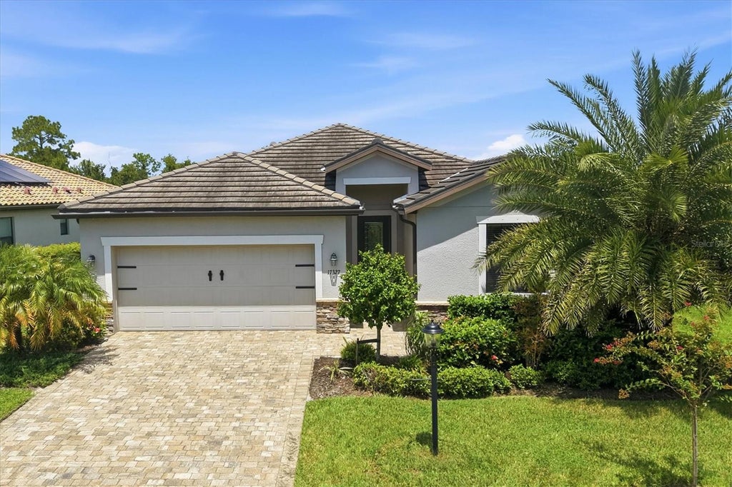 Photo of 17327 Blue Ridge Place, Bradenton, FL 34211 (MLS # A4702589)