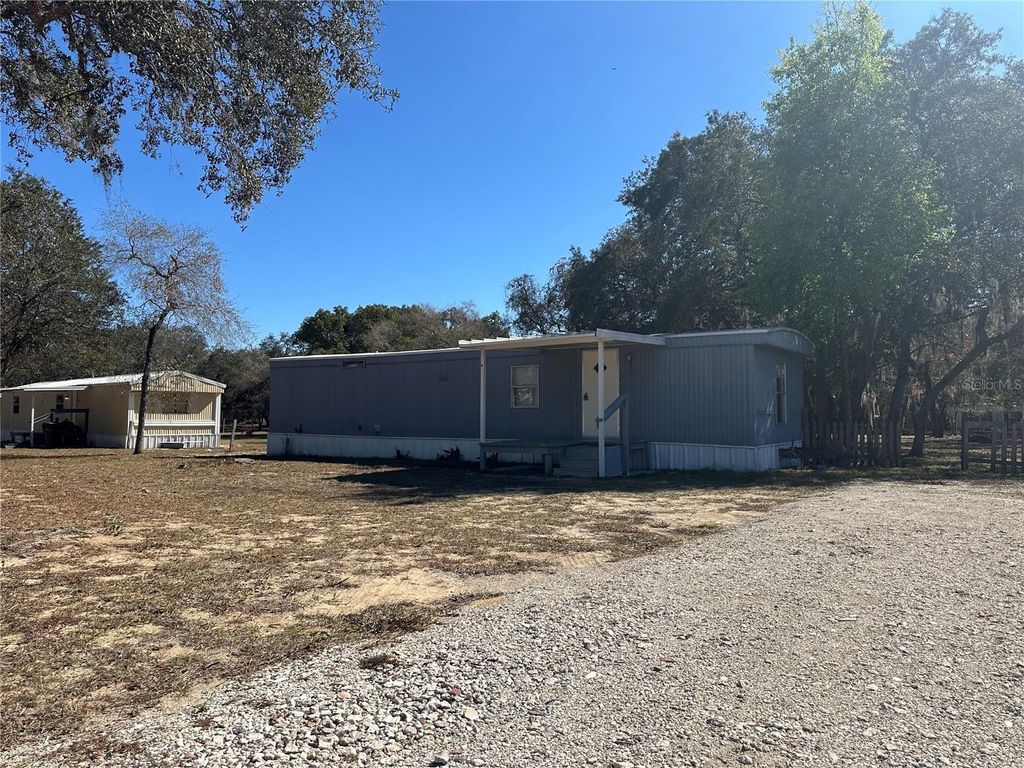 Photo of 2674 Chuck Wagon Way, Lake Wales, FL 33898 (MLS # K4903289)
