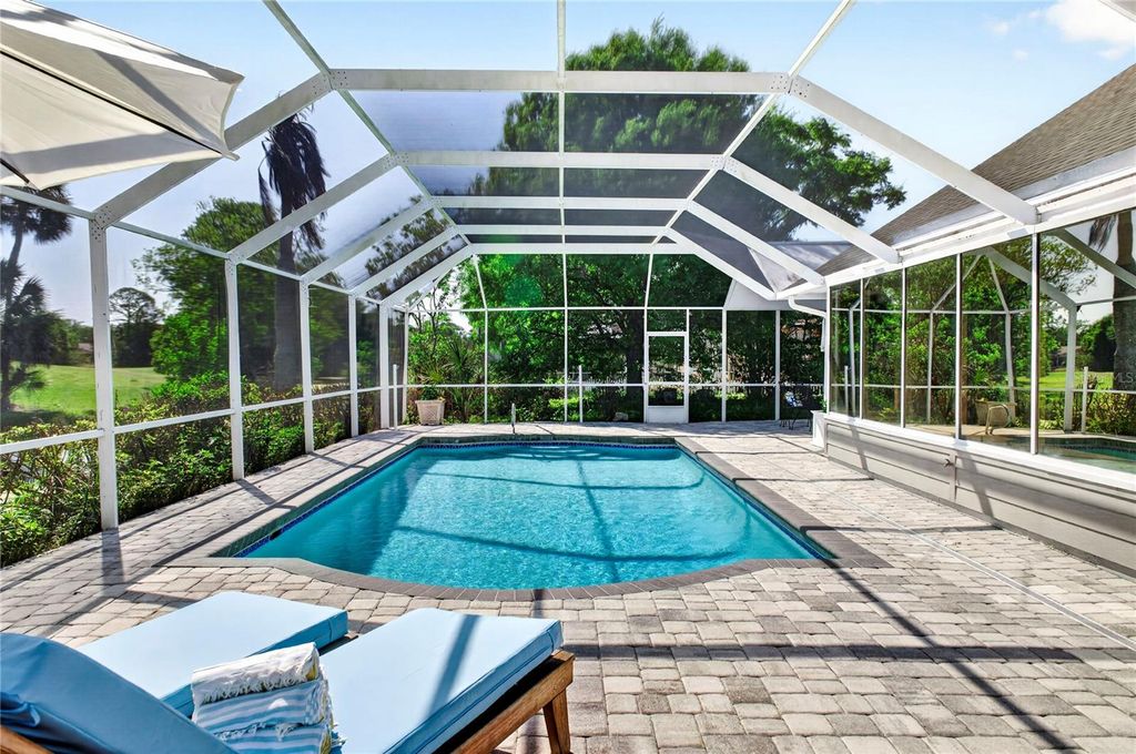 Photo of 770 Pelican Bay Drive, Daytona Beach, FL 32119 (MLS # V4948597)