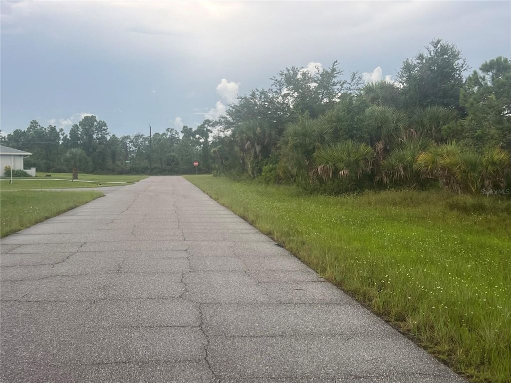 Photo of 3459 Miller St, Port Charlotte, FL 33981 (MLS # C7513131)