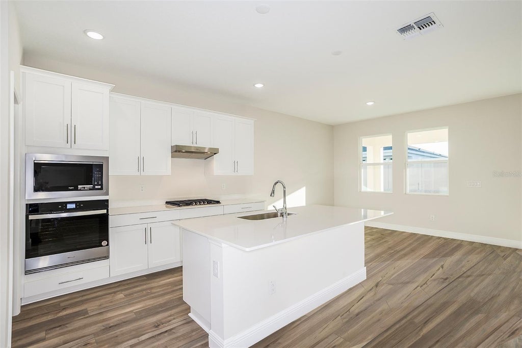 Photo of 33495 Hammock Beach Way, Dade City, FL 33525 (MLS # TB8545482)